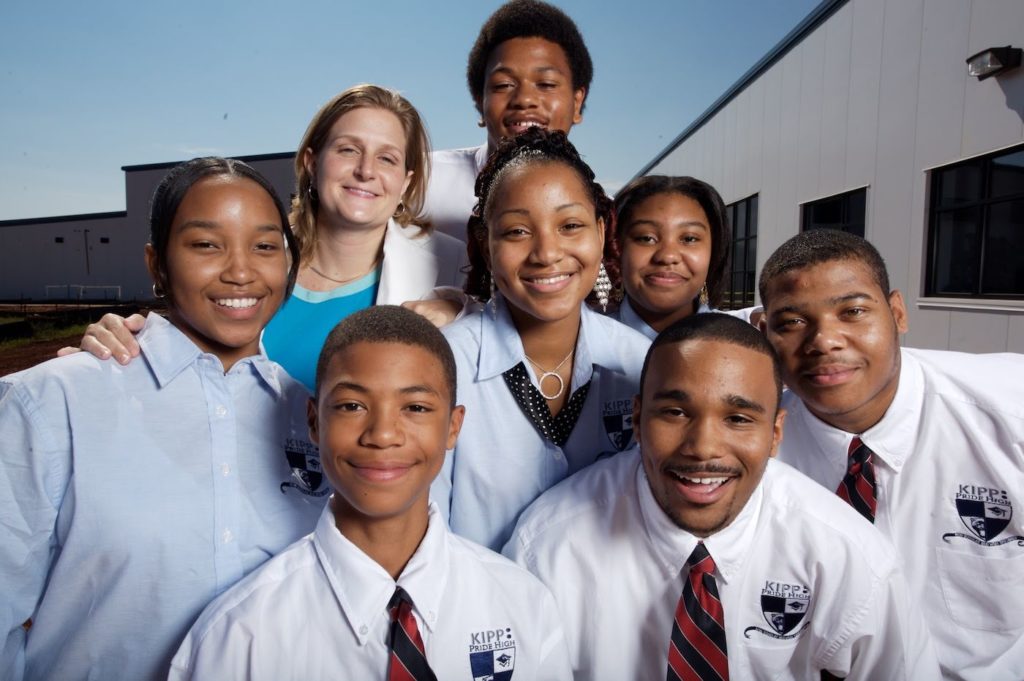 <p>KIPP Gaston co-founder Tammi Sutton in 2006 with students, including<br />
some members of the founding class of 2009 (Photo courtesy of KIPP Gaston)</p>
